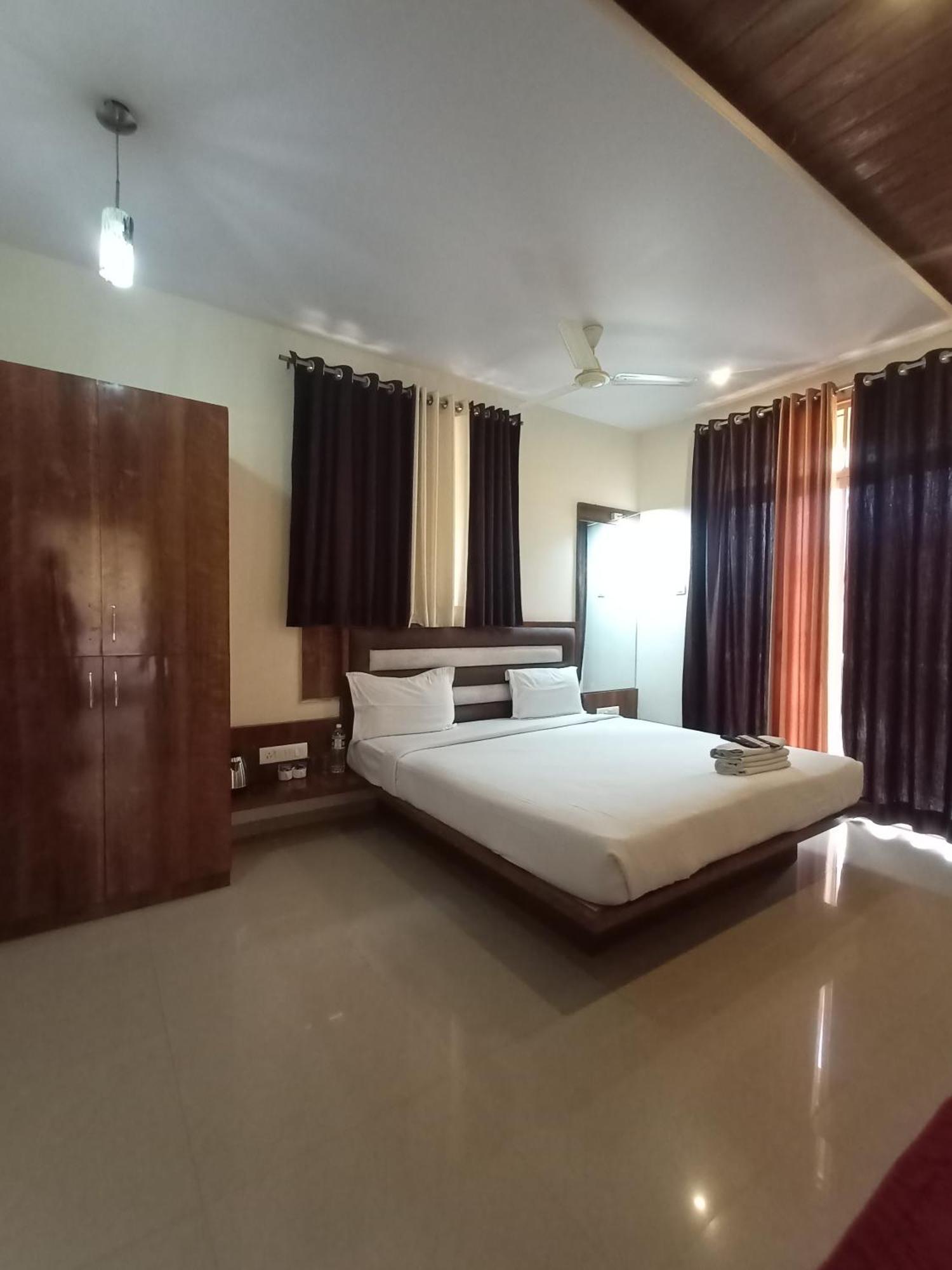 Hotel Oakwood Mahābaleshwar Rom bilde