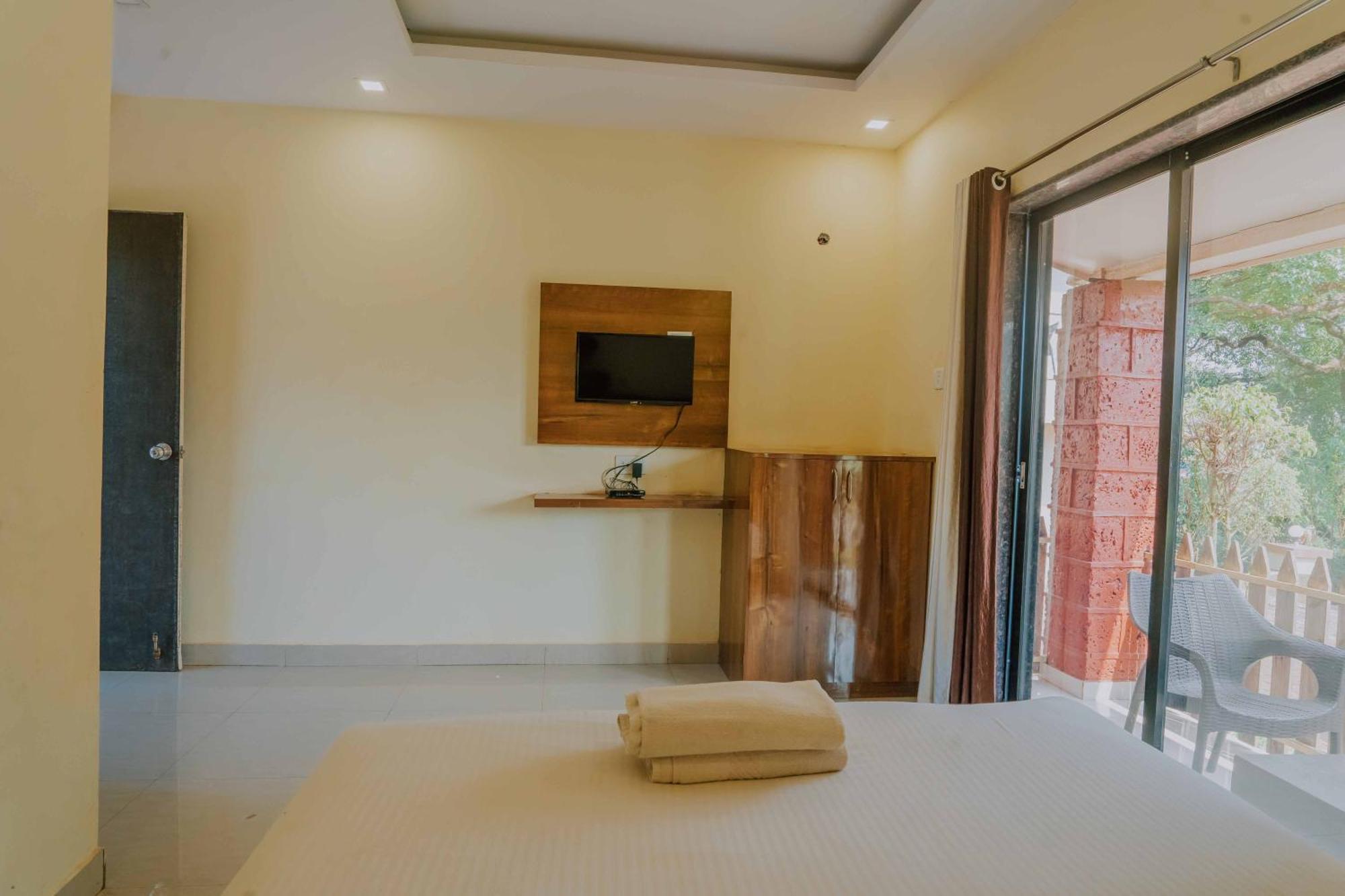 Hotel Oakwood Mahābaleshwar Rom bilde